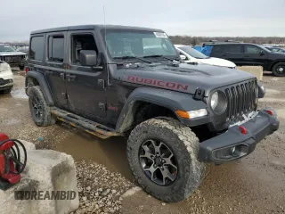 2018 Jeep Wrangler Unlimited Rubicon with VIN 1C4HJXFG7JW167144, listed as a Copart auction lot 48066285 with 132,399 mi miles and Salvage title. Bid and sale history available at DreamBid. Image 4.