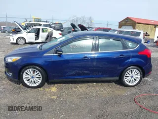 2017 Ford Focus Titanium with VIN 1FADP3N25HL272276, listed as a IAAI auction lot 41630327 with 110,899 mi miles and . Bid and sale history available at DreamBid. Image 14.
