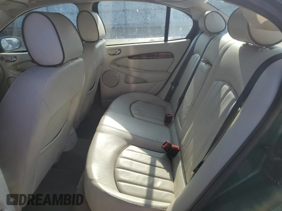 2007 Jaguar X-Type z VIN SAJWA51A17WJ20376, wystawiony jako Copart lot #52513655 z przebiegiem 162 104 mil mil oraz Tytuł czysty. Historia ofert i sprzedaży dostępna na DreamBid. Obrazek 10.