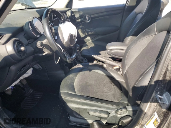 2017 MINI Hardtop 4 Door Cooper с VIN WMWXU1C39H2F92805, выставлен на аукционе Copart как лот 61665635 с пробегом 74 295 миль миль и Списание • Salvage title. История ставок и продаж доступна на DreamBid. Изображение 7.