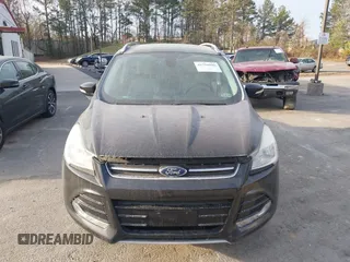 2015 Ford Escape Titanium with VIN 1FMCU0J98FUA19911, listed as a IAAI auction lot 41750596 with 106,706 mi miles. Bid and sale history available at carsss.com. Image 12.