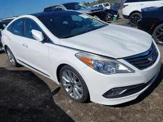2016 Hyundai Azera Limited with VIN KMHFH4JG0GA508622, listed as a IAAI auction lot 41598287 with 69,013 mi miles and . Bid and sale history available at carsss.com. Image 1.