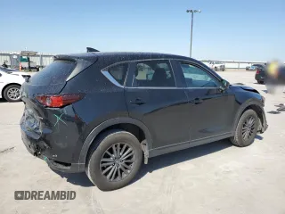 2021 Mazda CX-5 Touring z VIN JM3KFBCM8M0321766, wystawiony jako Copart lot #52845085 z przebiegiem 115 627 mil mil oraz Szkody całkowita. Historia ofert i sprzedaży dostępna na DreamBid. Obrazek 3.