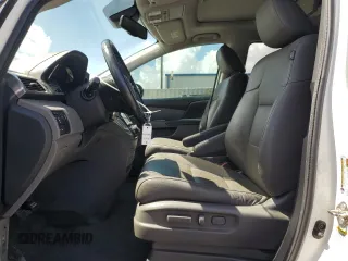 2017 Honda Odyssey Touring z VIN 5FNRL5H99HB007993, wystawiony jako Copart lot #60501805 z przebiegiem 104 628 mil mil oraz Szkoda całkowita • Salvage title. Historia ofert i sprzedaży dostępna na DreamBid. Obrazek 7.