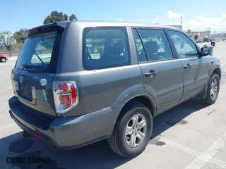 2007 Honda Pilot LX with VIN 5FNYF28187B040543, listed as a IAAI auction lot 41964267 with 237,081 mi miles. Bid and sale history available at carsss.com. Image 4.