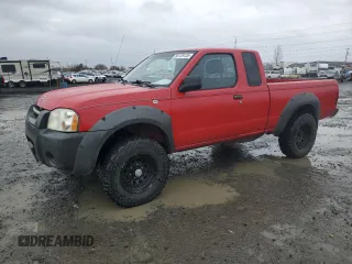 2002 Nissan Frontier XE z VIN 1N6ED26Y22C344141, wystawiony jako Copart lot #50128135 z przebiegiem 237 576 mil mil oraz Czysty tytuł • Clean title. Historia ofert i sprzedaży dostępna na DreamBid. Obrazek 1.