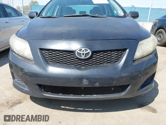 2009 Toyota Corolla with VIN 1NXBU40E89Z056754, listed as a IAAI auction lot 41989594 with 187,890 mi miles. Bid and sale history available at carsss.com. Image 6.