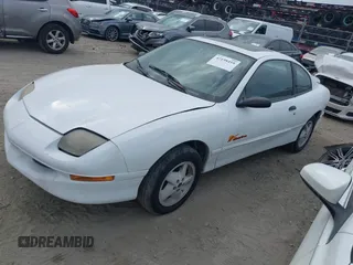 1999 Pontiac Sunfire SE z VIN 1G2JB1247X7582141, wystawiony jako IAAI lot #42198418 z przebiegiem Nie podano mil oraz . Historia ofert i sprzedaży dostępna na DreamBid. Obrazek 2.