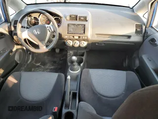 2007 Honda Fit Sport with VIN JHMGD37657S061775, listed as a Copart auction lot 69941734 with 213,944 mi miles and Salvage Title. Bid and sale history available at carsss.com. Image 8.