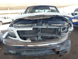 2003 Ford F-150 XL with VIN 1FTRX18L03NA45728, listed as a IAAI auction lot 41860421 with 179,596 mi miles. Bid and sale history available at carsss.com. Image 6.