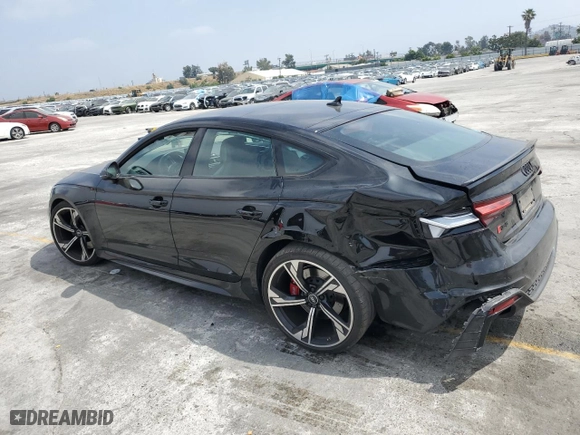 2021 Audi RS 5 Sportback with VIN WUAAWCF53MA904838, listed as a Copart auction lot 56450664 with 46,020 mi miles and Salvage Title. Bid and sale history available at carsss.com. Image 2.