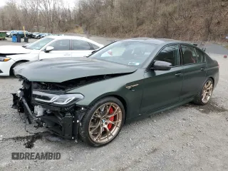 2022 BMW M5 z VIN WBS73CH08NCJ48715, wystawiony jako Copart lot #52970105 z przebiegiem 3498 mil mil oraz Szkody całkowita. Historia ofert i sprzedaży dostępna na DreamBid. Obrazek 1.