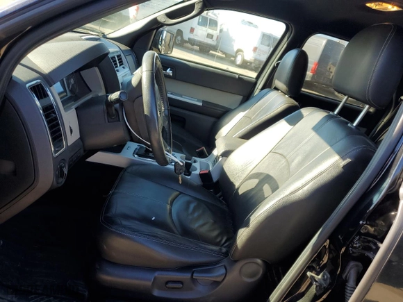 2010 Mercury Mariner Premier with VIN 4M2CN8H71AKJ24843, listed as a Copart auction lot 41851875 with 147,858 mi miles and Salvage Title. Bid and sale history available at carsss.com. Image 7.