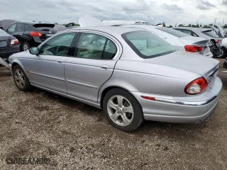 2002 Jaguar X-Type with VIN SAJEA51C02WC20249, listed as a Copart auction lot 69661244 with 97,184 mi miles and Clean Title. Bid and sale history available at carsss.com. Image 2.