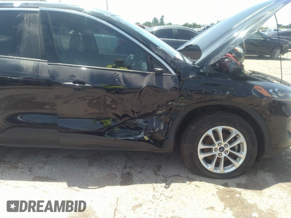 2020 Ford Escape SE with VIN 1FMCU0G61LUB77189, listed as a IAAI auction lot 42223410 with 101,407 mi miles and . Bid and sale history available at DreamBid. Image 6.