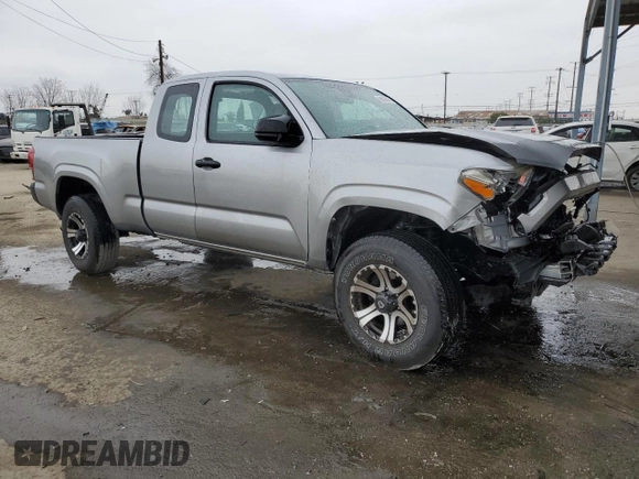 2018 Toyota Tacoma SR with VIN 5TFRX5GN1JX124112, listed as a Copart auction lot 50596975 with 57,587 mi miles and Salvage Title. Bid and sale history available at DreamBid. Image 4.