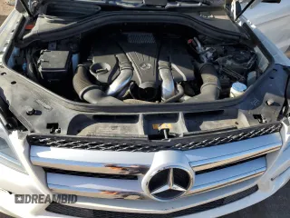 2014 Mercedes-Benz GL 450 z VIN 4JGDF7CE0EA395164, wystawiony jako Copart lot #51081185 z przebiegiem 92 321 mil mil oraz Szkody całkowita. Historia ofert i sprzedaży dostępna na DreamBid. Obrazek 14.