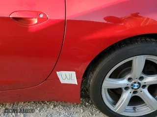 2010 BMW Z4 sDrive30i with VIN WBALM5C55AE377253, listed as a Copart auction lot 74230184 with 0 mi miles and Salvage Title. Bid and sale history available at carsss.com. Image 12.