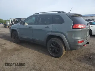 2014 Jeep Cherokee Trailhawk with VIN 1C4PJMBS3EW308706, listed as a Copart auction lot 58307975 with 90,530 mi miles and Salvage title. Bid and sale history available at DreamBid. Image 2.