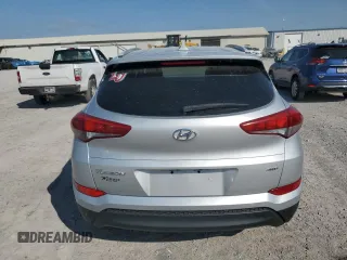 2018 Hyundai Tucson SEL with VIN KM8J3CA42JU754134, listed as a Copart auction lot 54520515 with 114,506 mi miles and Salvage title. Bid and sale history available at DreamBid. Image 6.