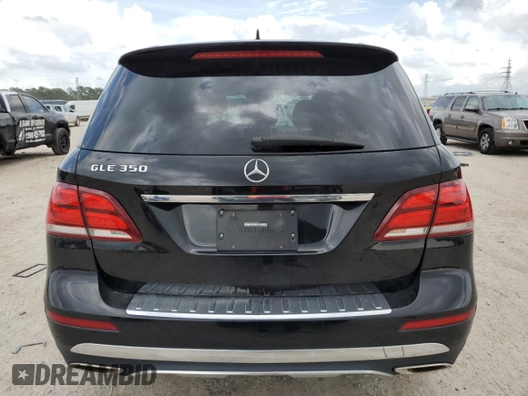 2016 Mercedes-Benz GLE 350 with VIN 4JGDA5JB3GA709565, listed as a Copart auction lot 54980125 with 96,876 mi miles and Salvage title. Bid and sale history available at DreamBid. Image 6.