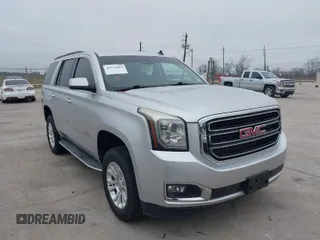 2015 GMC Yukon SLT with VIN 1GKS1BKC3FR253184, listed as a IAAI auction lot 41574610 with 152,543 mi miles. Bid and sale history available at carsss.com. Image 1.