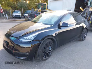 2020 Tesla Model Y Long Range with VIN 5YJYGDEF2LF037298, listed as a IAAI auction lot 37832056 with 40,417 mi miles and . Bid and sale history available at DreamBid. Image 20.