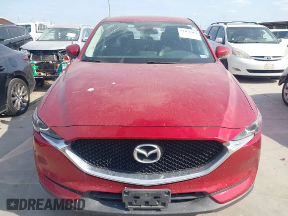 2017 Mazda CX-5 Touring with VIN JM3KFACL3H0195212, listed as a IAAI auction lot 42041361 with 57,377 mi miles and . Bid and sale history available at carsss.com. Image 12.