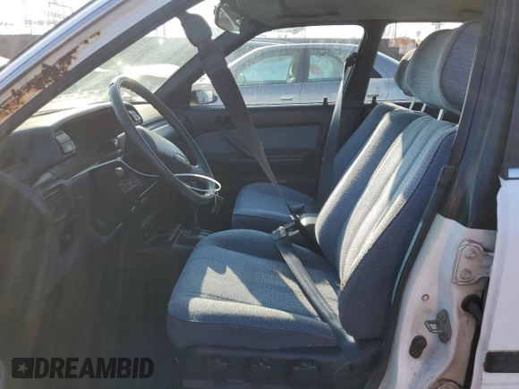 1990 Toyota Camry z VIN JT2SV21E3L0349179, wystawiony jako Copart lot #75125234 z przebiegiem 138 635 mil mil oraz Czysty tytuł • Clean title. Historia ofert i sprzedaży dostępna na DreamBid. Obrazek 7.