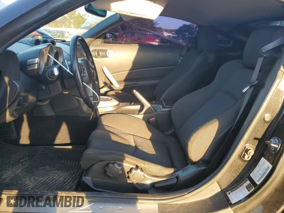 2007 Nissan 350Z with VIN JN1BZ34D37M504870, listed as a Copart auction lot 74778484 with 103,289 mi miles and Salvage Title. Bid and sale history available at DreamBid. Image 7.
