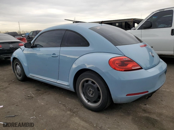 2012 Volkswagen Beetle 2.5L w/Sun/Sound/Nav PZEV with VIN 3VWJP7AT9CM618529, listed as a Copart auction lot 84940494 with 102,838 mi miles and Salvage Title. Bid and sale history available at carsss.com. Image 2.