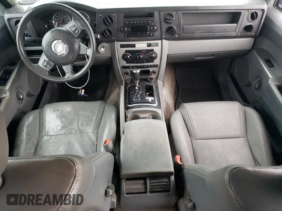 2007 Jeep Commander Sport with VIN 1J8HG48P57C598773, listed as a Copart auction lot 66291824 with 281,211 mi miles and Salvage Title. Bid and sale history available at carsss.com. Image 8.