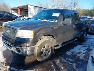 2007 Ford F-150 STX with VIN 1FTRX14W17FB65876, listed as a IAAI auction lot 41318821 with 206,254 mi miles. Bid and sale history available at carsss.com. Image 2.