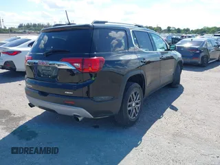 2017 GMC Acadia SLT with VIN 1GKKNULS7HZ277982, listed as a IAAI auction lot 41909447 with 136,272 mi miles. Bid and sale history available at carsss.com. Image 4.