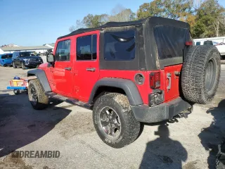 2018 Jeep Wrangler JK Unlimited Sport S with VIN 1C4BJWDG2JL899265, listed as a Copart auction lot 85165474 with 102,619 mi miles and Salvage Title. Bid and sale history available at carsss.com. Image 2.