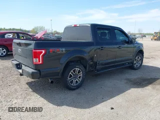2015 Ford F-150 XLT with VIN 1FTEW1EG3FKE16010, listed as a IAAI auction lot 42107938 with 242,625 mi miles and . Bid and sale history available at DreamBid. Image 4.