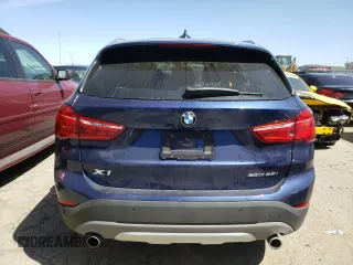 2018 BMW X1 sDrive28i with VIN WBXHU7C33J5L06428, listed as a Copart auction lot 48210333 with 33,965 mi miles. Bid and sale history available at carsss.com. Image 6.
