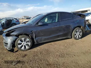 2023 Tesla Model Y Long Range z VIN 7SAYGDEE5PF895459, wystawiony jako Copart lot #47848075 z przebiegiem 27 675 mil mil oraz Szkoda całkowita • Salvage title. Historia ofert i sprzedaży dostępna na DreamBid. Obrazek 1.