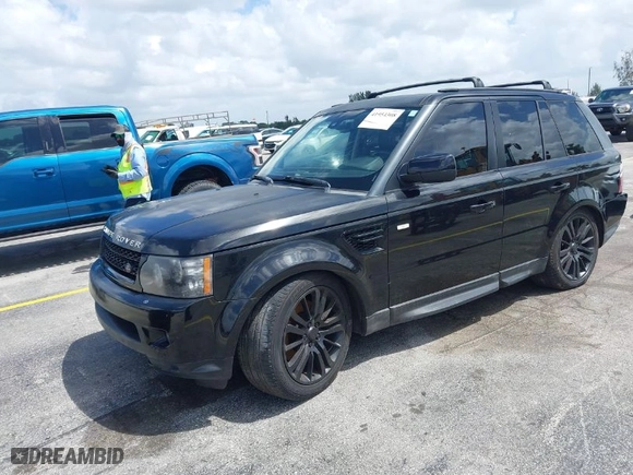 2013 Land Rover Range Rover Sport HSE LUX with VIN SALSK2D43DA760864, listed as a IAAI auction lot 41954308 with 98,514 mi miles. Bid and sale history available at carsss.com. Image 2.