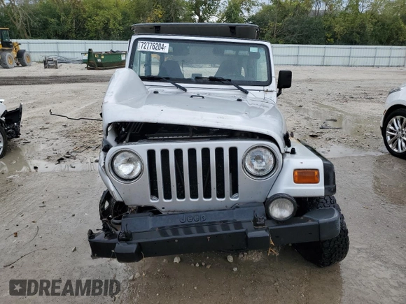 2002 Jeep Wrangler Sport with VIN 1J4FA49S32P733909, listed as a Copart auction lot 72776204 with 157,508 mi miles and Non Repairable. Bid and sale history available at carsss.com. Image 5.