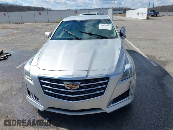 2015 Cadillac CTS RWD with VIN 1G6AP5SX5F0115745, listed as a IAAI auction lot 41658935 with 62,477 mi miles and . Bid and sale history available at DreamBid. Image 12.