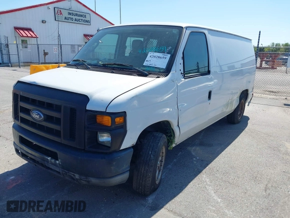 2011 Ford Econoline Cargo Commercial with VIN 1FTNE1EW6BDA44784, listed as a IAAI auction lot 42028659 with 141,661 mi miles and . Bid and sale history available at carsss.com. Image 2.