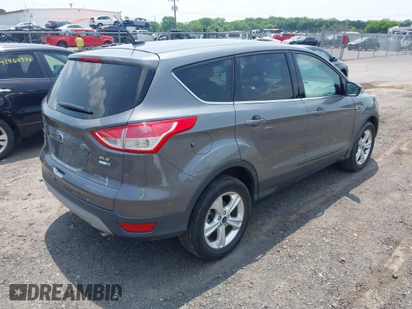 2014 Ford Escape SE with VIN 1FMCU9GX1EUE21729, listed as a IAAI auction lot 42475113 with 116,050 mi miles and . Bid and sale history available at DreamBid. Image 4.