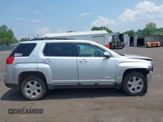 2014 GMC Terrain SLE with VIN 2GKFLWE39E6203740, listed as a IAAI auction lot 42434151 with 100,988 mi miles and . Bid and sale history available at DreamBid. Image 13.