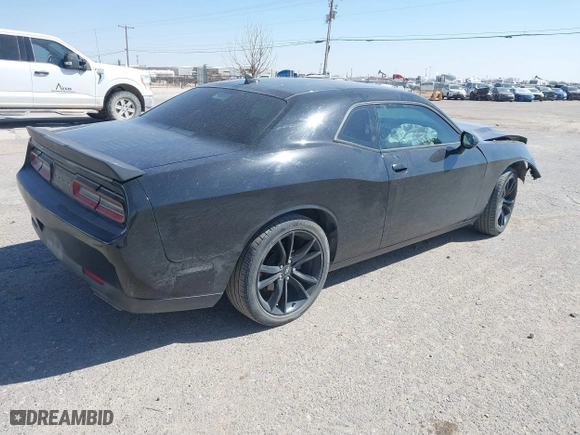 2017 Dodge Challenger SXT Plus with VIN 2C3CDZAG9HH501594, listed as a IAAI auction lot 41628513 with 151,399 mi miles. Bid and sale history available at carsss.com. Image 4.