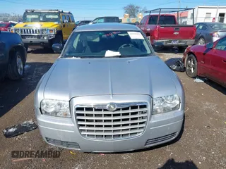 2005 Chrysler 300 with VIN 2C3JA43RX5H569173, listed as a IAAI auction lot 41618421 with 126,019 mi miles. Bid and sale history available at carsss.com. Image 6.