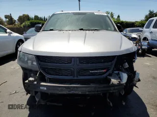 2017 Dodge Journey SXT z VIN 3C4PDCBG7HT547666, wystawiony jako Copart lot #57987875 z przebiegiem 124 484 mil mil oraz Szkoda całkowita • Salvage title. Historia ofert i sprzedaży dostępna na DreamBid. Obrazek 5.