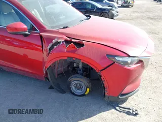 2016 Mazda CX-9 Touring z VIN JM3TCBCY7G0100311, wystawiony jako IAAI lot #41588448 z przebiegiem 115 364 mil mil oraz . Historia ofert i sprzedaży dostępna na DreamBid. Obrazek 6.
