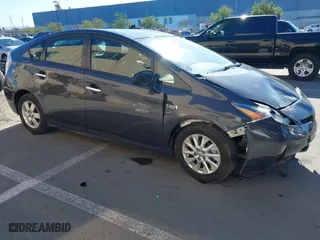 2014 Toyota Prius Plug-In with VIN JTDKN3DP0E3057937, listed as a IAAI auction lot 41494132 with 142,169 mi miles. Bid and sale history available at carsss.com. Image 1.