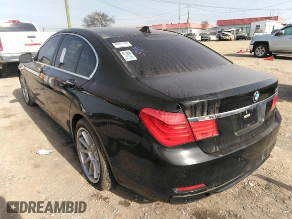2011 BMW 7 Series 740i with VIN WBAKA4C55BC612634, listed as a IAAI auction lot 35404385 with 156,003 mi miles. Bid and sale history available at carsss.com. Image 3.